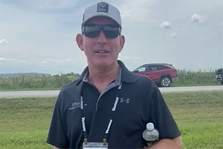Greg Wiemelt is standing in a field
