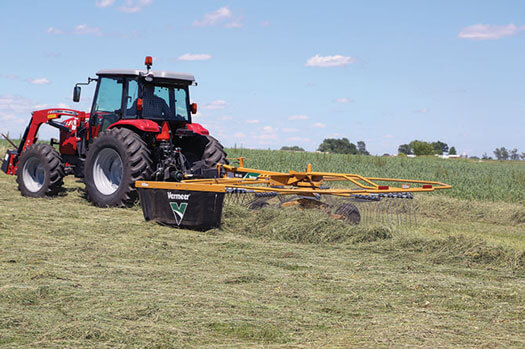 On the Job Training: Boys and Bale Hooks - Farm Collector