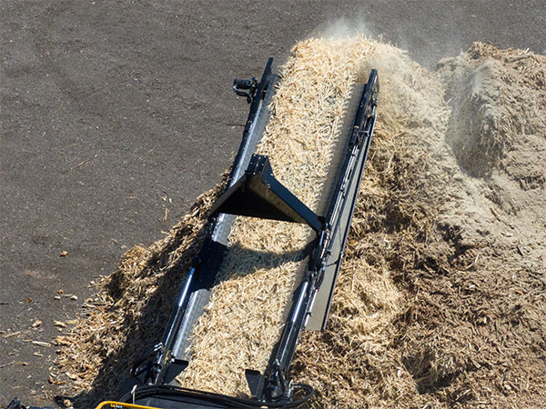 Conveyor of Vermeer grinder releasing product using the productivity monitoring system