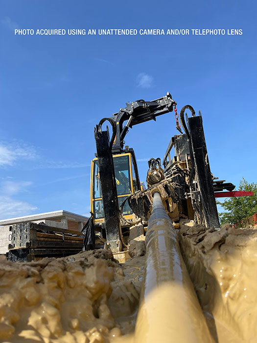 A Vermeer utility drill is in operation
